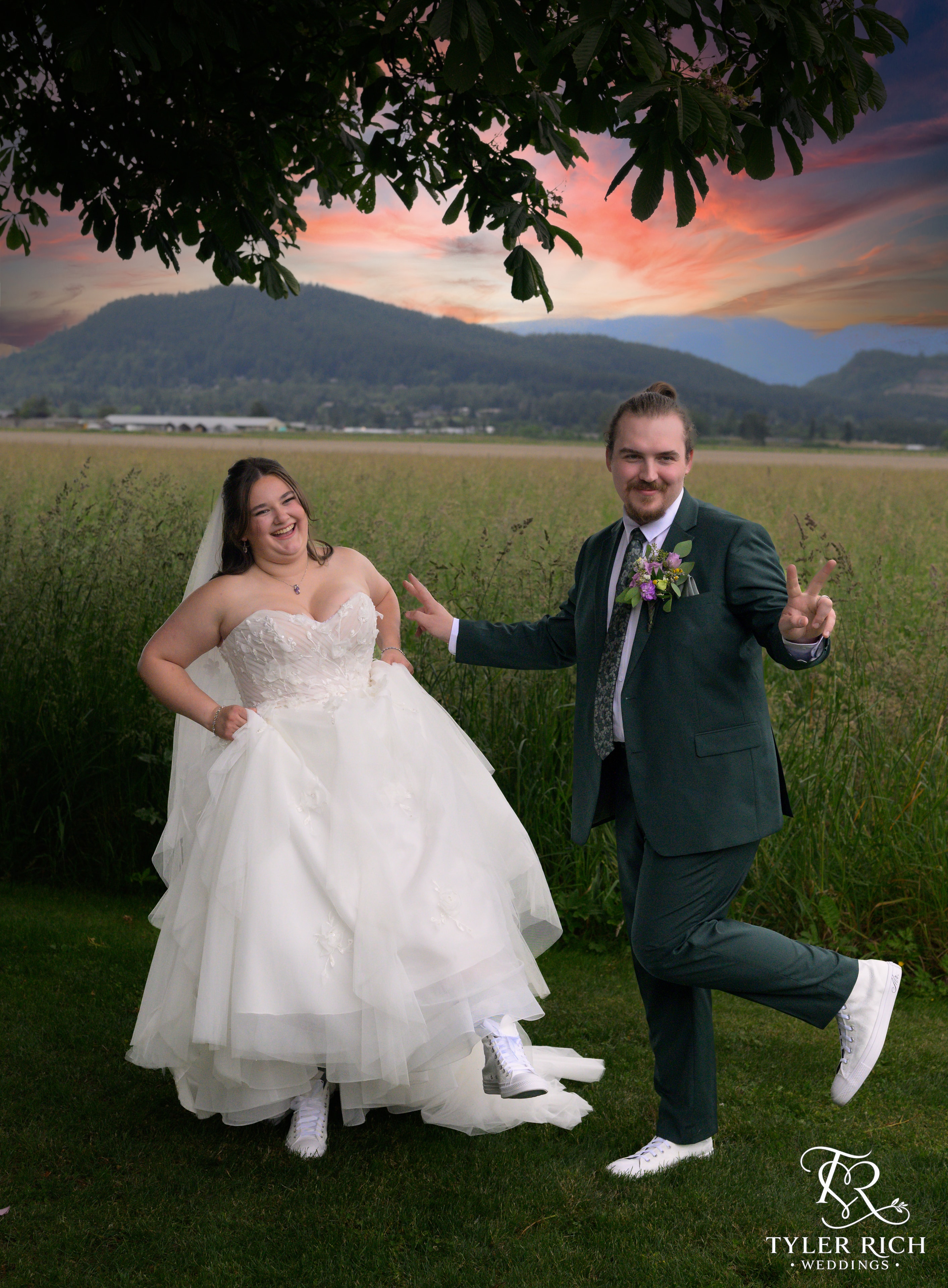 Couple celebrating in a rural valley landscape